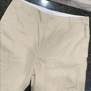 Khaki cargo live in straight shorts.